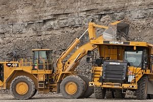 Stoneco working loading product into a dump truck at the quarry